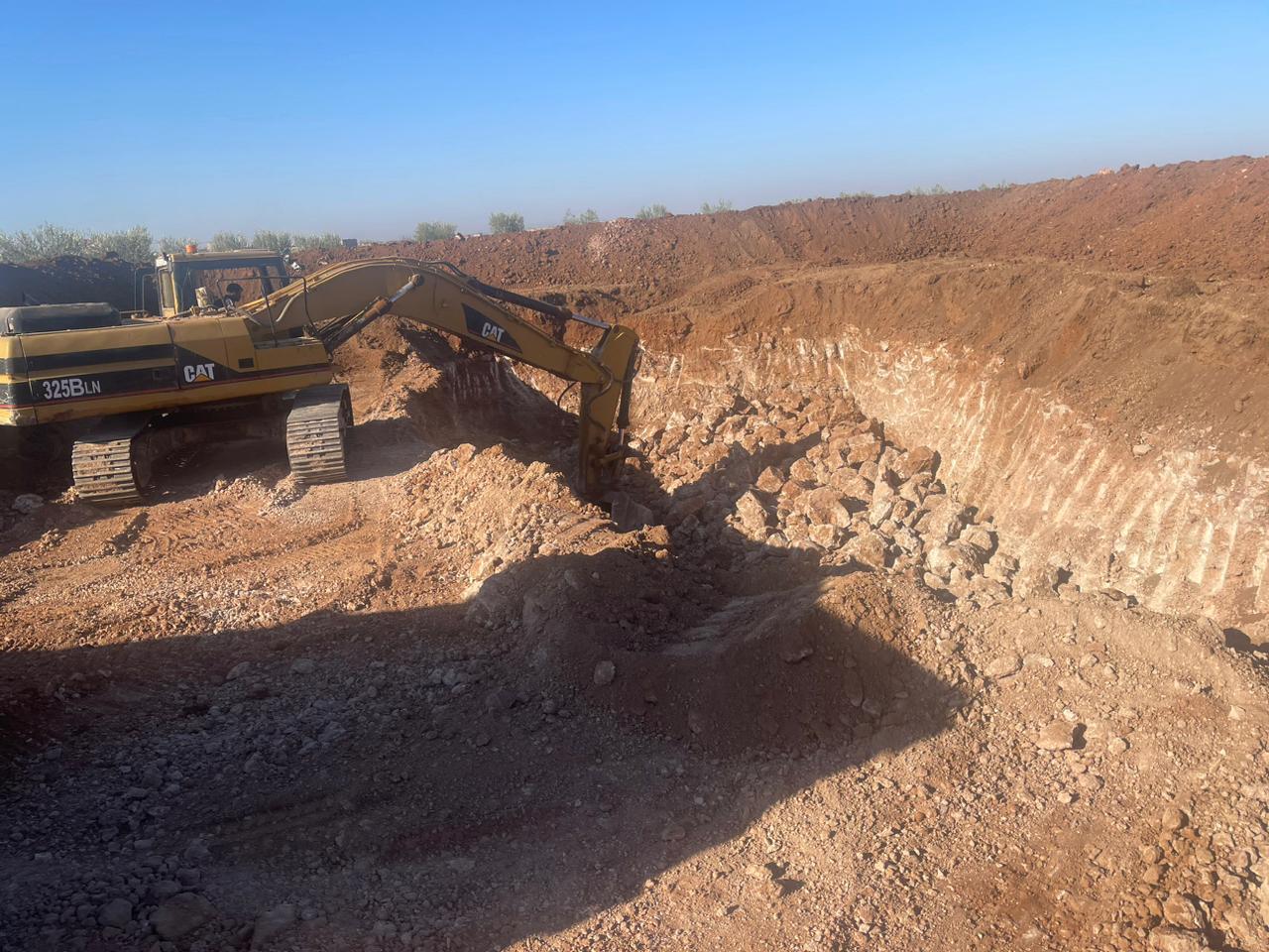 Excavation work with heavy machinery