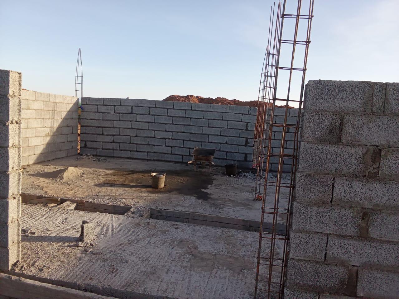 Concrete block walls of a structure under construction